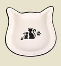 Animozen white ceramic cat-shaped pet bowl with black trim and cat/paw print design.