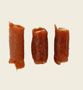 Animozen chicken and rice cigar-shaped dog treats, low fat, gluten-free, and sugar-free.
