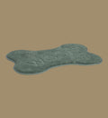 Animozen coussin pour chien en forme d'os vert en textile doux avec inscription "WOOF!" et empreintes de patte.