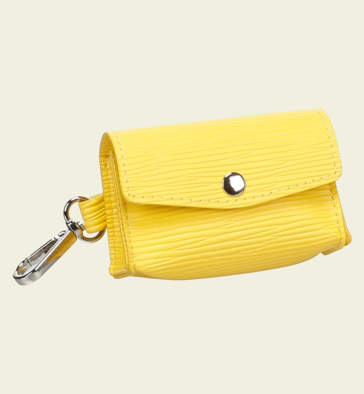 Distributeur de sacs à déjections pour chien Animozen jaune en polyester, avec mousqueton et bouton-pression.