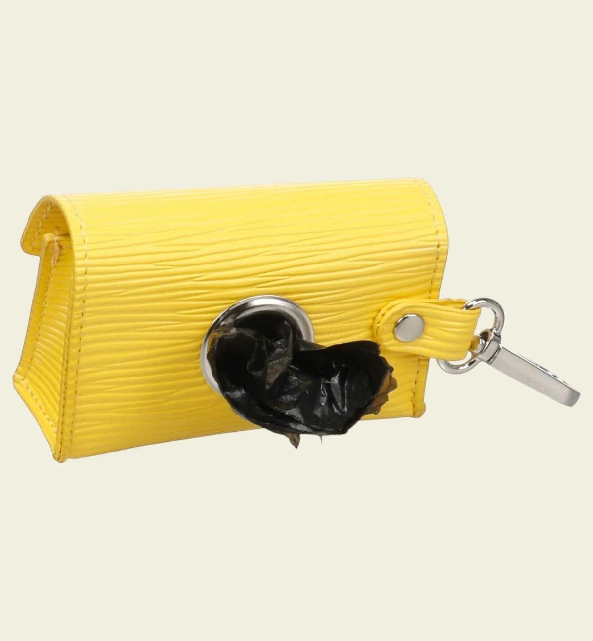 Animozen distributeur de sacs à déjections pour chien jaune en polyester avec mousqueton et sac noir sorti.