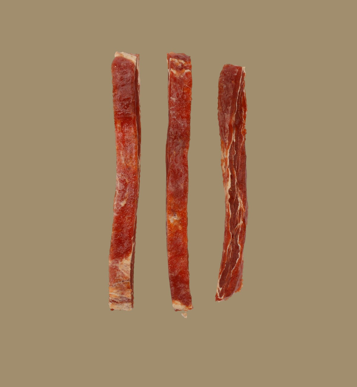 Animozen : 3 lanières de friandises pour chien au canard et cabillaud, texture tendre et savoureuse.
