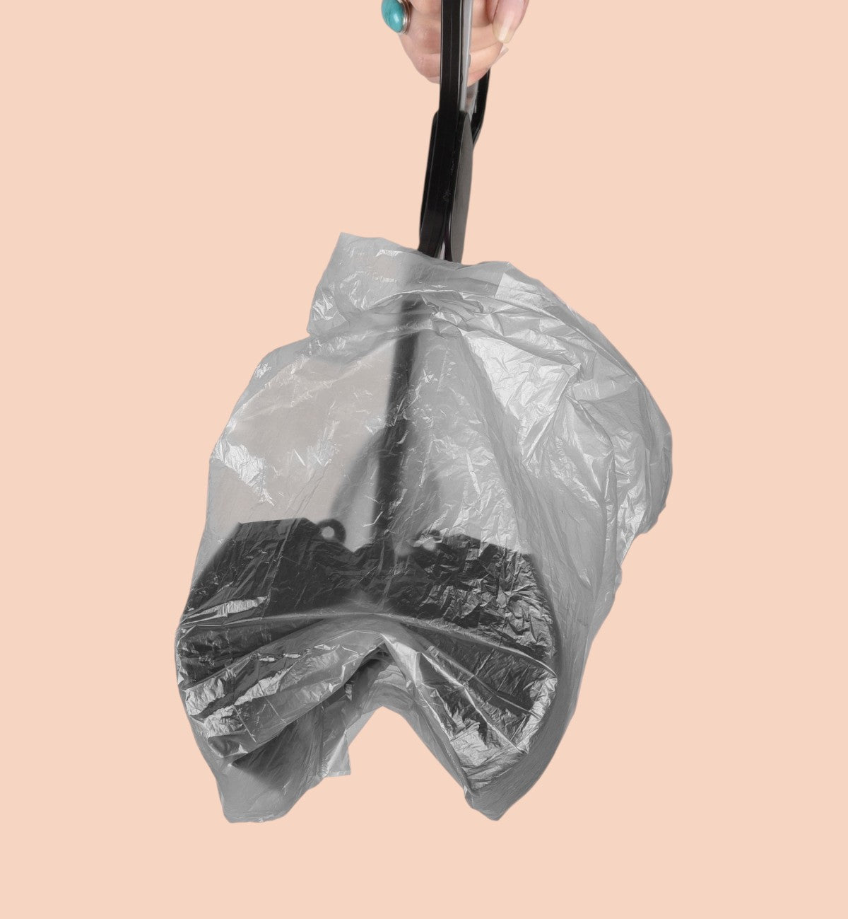 Pelle à déjections pour chien Animozen en plastique noir et gris, avec poignée à pression et pince.