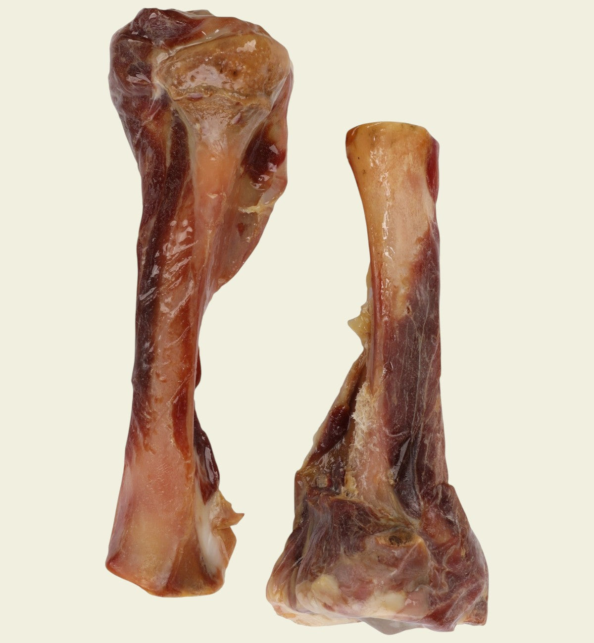 Animozen natural pork tibia bone dog chew, a long-lasting, meat-covered bone for dental hygiene and boredom relief.