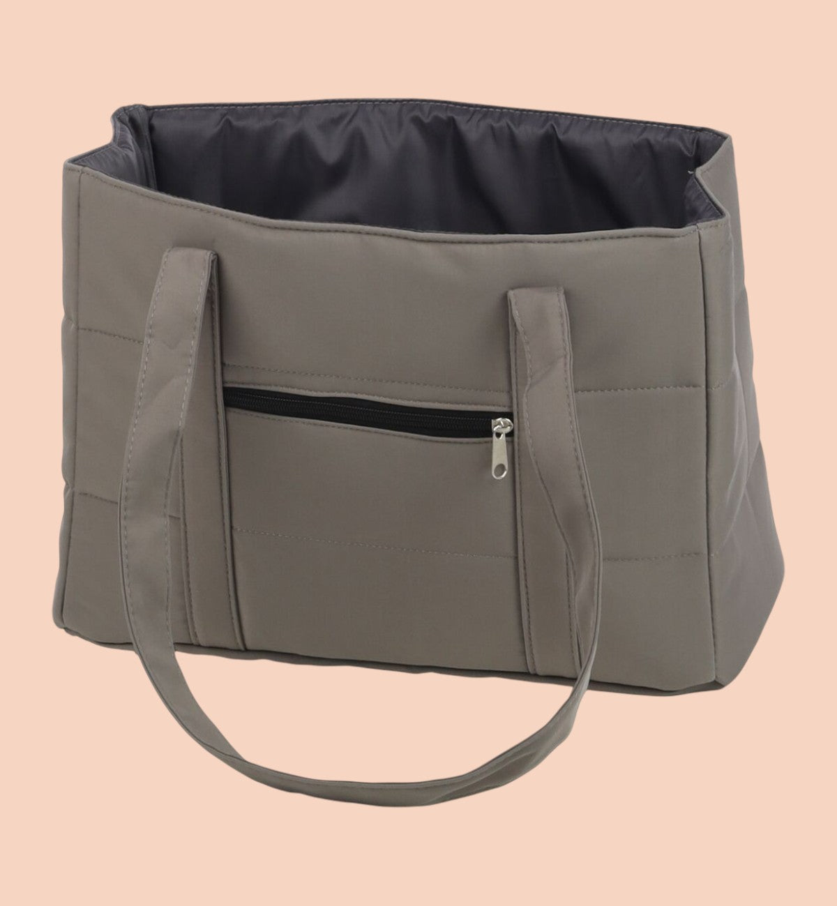 Sac de transport pour chien Animozen Miguel taupe en polyester matelassé avec poche zippée et anses. Dimensions 40x20x27cm.